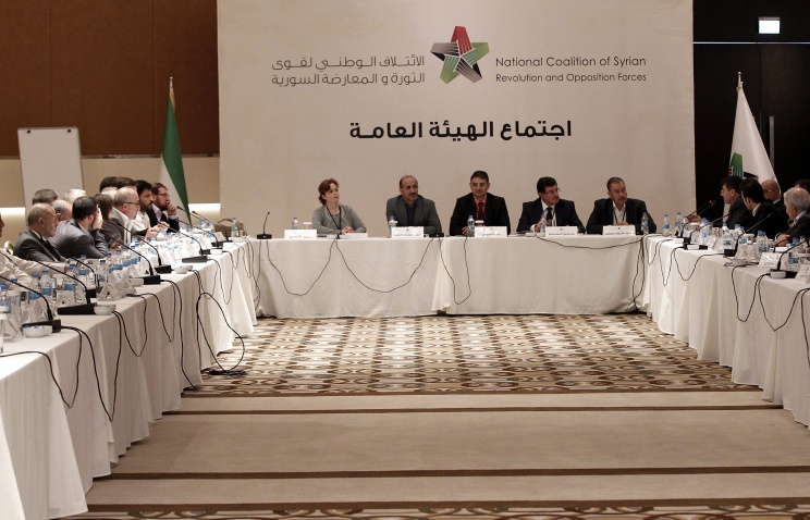 Оппозиционная коалиция Сирии примет участие в "Женеве-2" только под знаменем революции