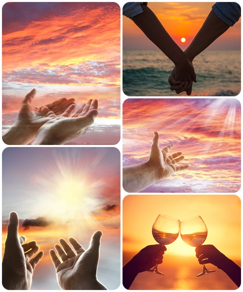 Hands and sunset - stock photo